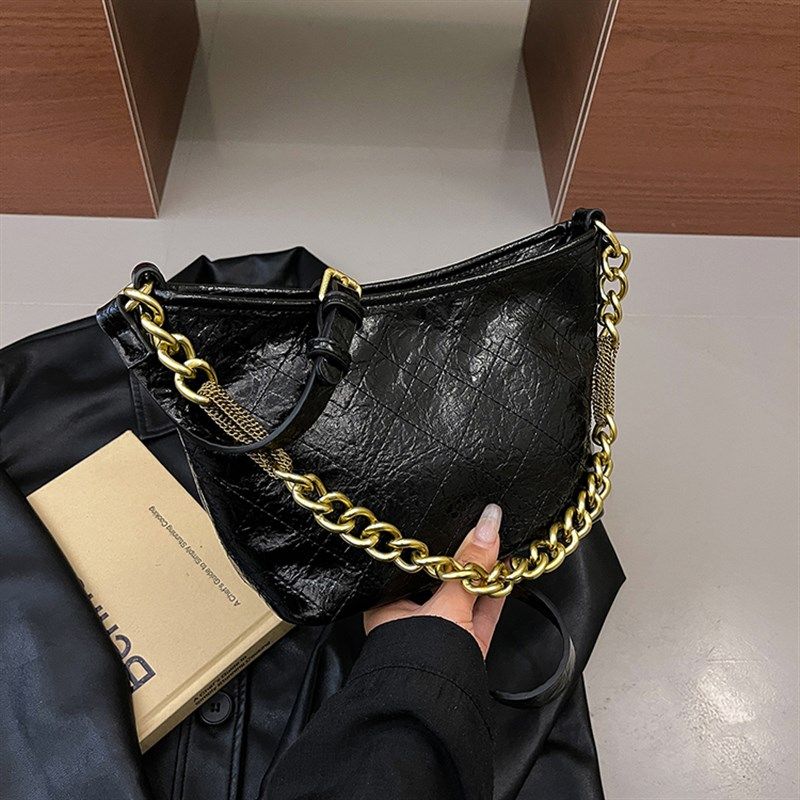 今年流行爆款包包女式2025新款超火爆裂纹M链条水桶包单肩斜挎小