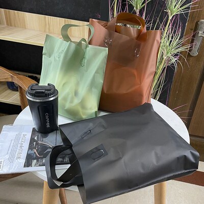 磨砂半透咖色服装k店手提袋子印字店名logo购物礼品袋胶袋现货