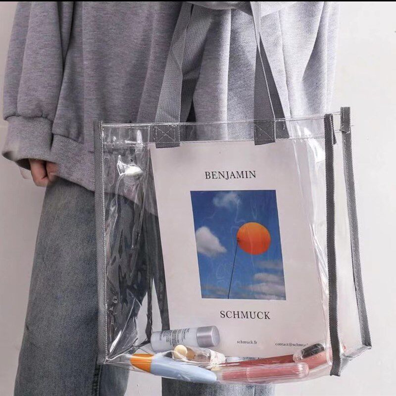 定制PVC加长加厚手提袋服饰包装袋购物袋字母图案透明pvc手提袋