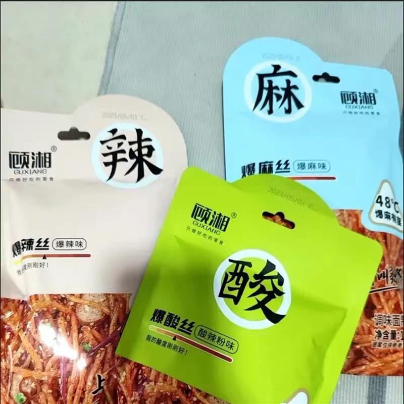 顾湘爆辣丝麻辣丝辣条酸辣图片