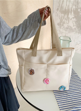 大容量白色斜跨袋日系纯色简约休闲单肩包学生上课通勤手提补课包