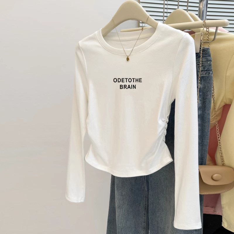 正肩纯棉长袖t恤女上衣2026新款春秋季不规则短款修身白色打底衫
