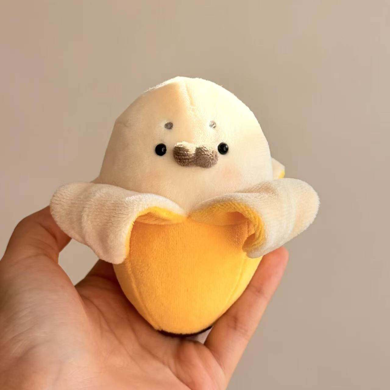 可爱香蕉海豹毛绒玩偶10cm公仔包包挂件棉花娃娃萌趣装饰礼物,模玩/动漫/周边/娃圈三坑/桌游,棉花娃娃,淘宝优惠券,粉丝福利购,淘宝优惠卷