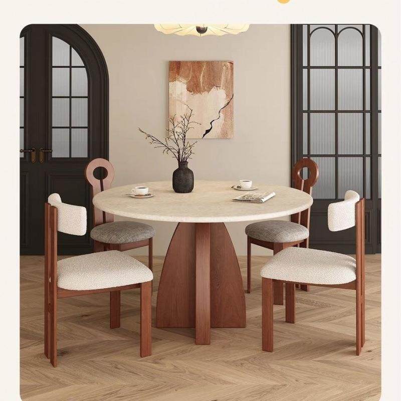 法式天然洞石餐桌圆形家用黑色实木小户型大理石圆中古风餐桌岩板