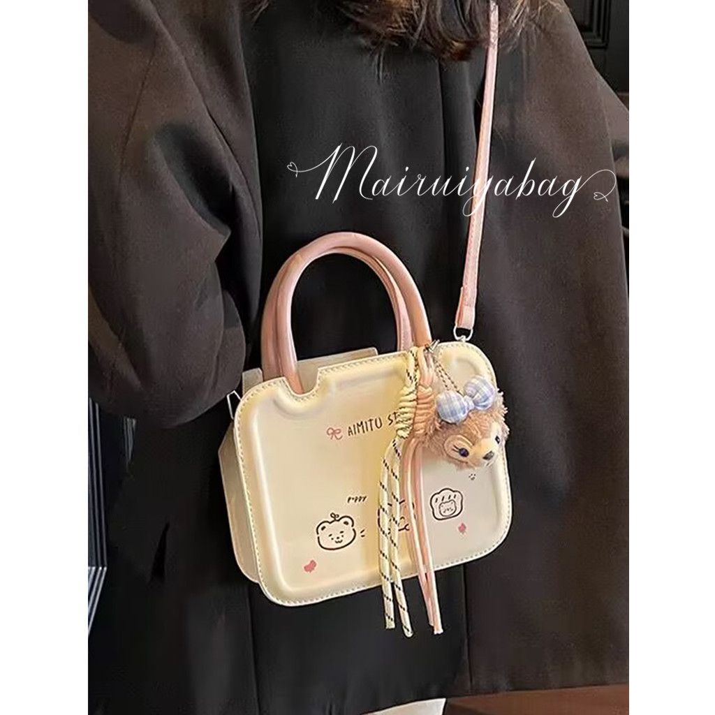 女包2025新款简约小众时尚质感洋气百搭通勤卡通斜挎饼干小方包