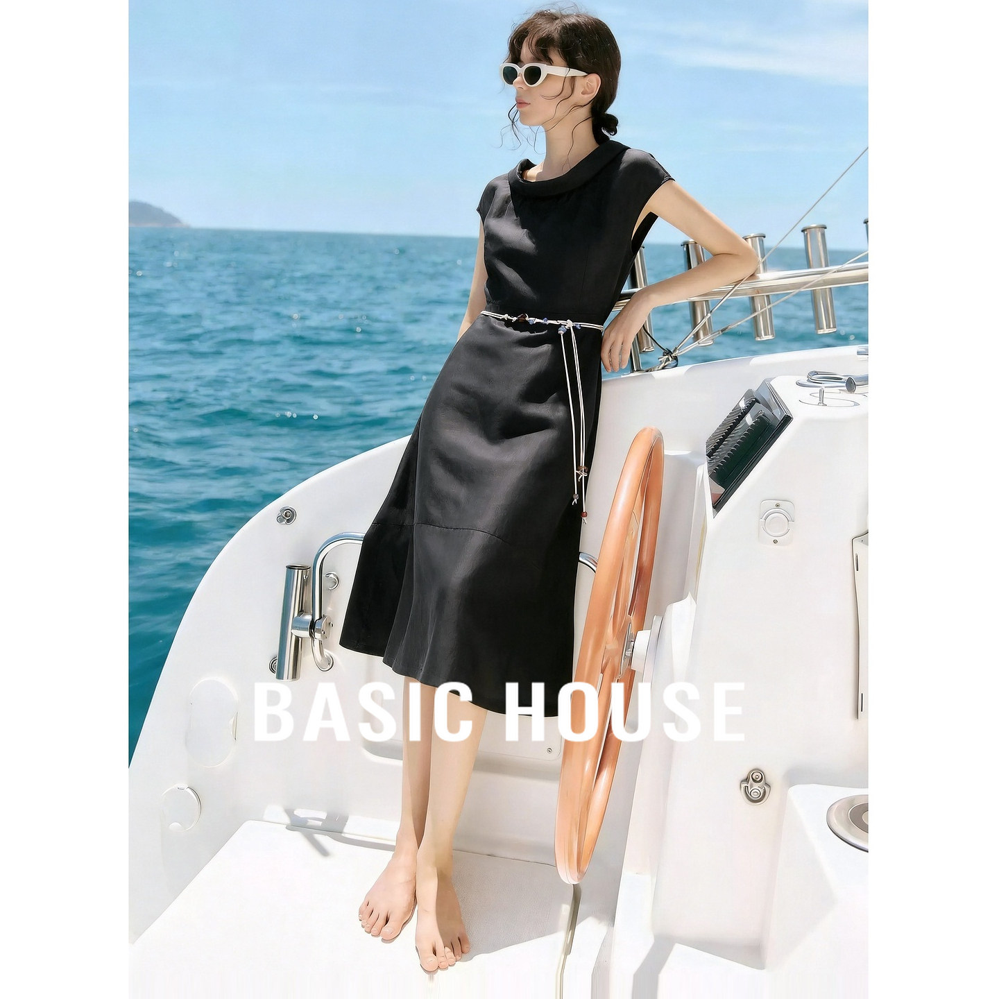 百家好莱赛尔黑色无袖连衣裙女收腰显瘦开叉中长裙优雅气质A字裙