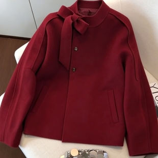 新年氛围感圣诞战袍蝴蝶结系带针织开衫高级感洋气别字大码毛衣女