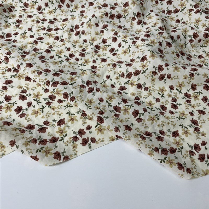 E506米色底小碎花印花雪纺布头 柔软垂坠透气连衣裙上衣旗袍面料