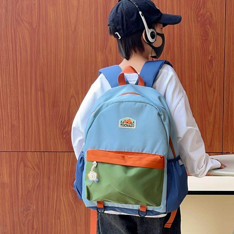 网红儿童帅气揹包韩版撞色小学生幼儿园书包轻便减负男女童双肩包