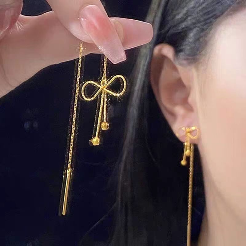 在逃公主金色蝴蝶结流苏耳线
