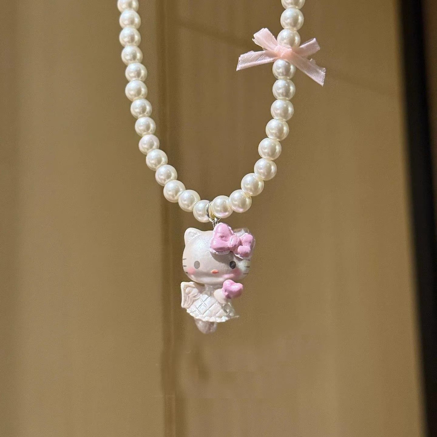 可爱粉色系带蝴蝶结KT猫吊坠珍珠项链女趣味长款颈链配饰锁骨链