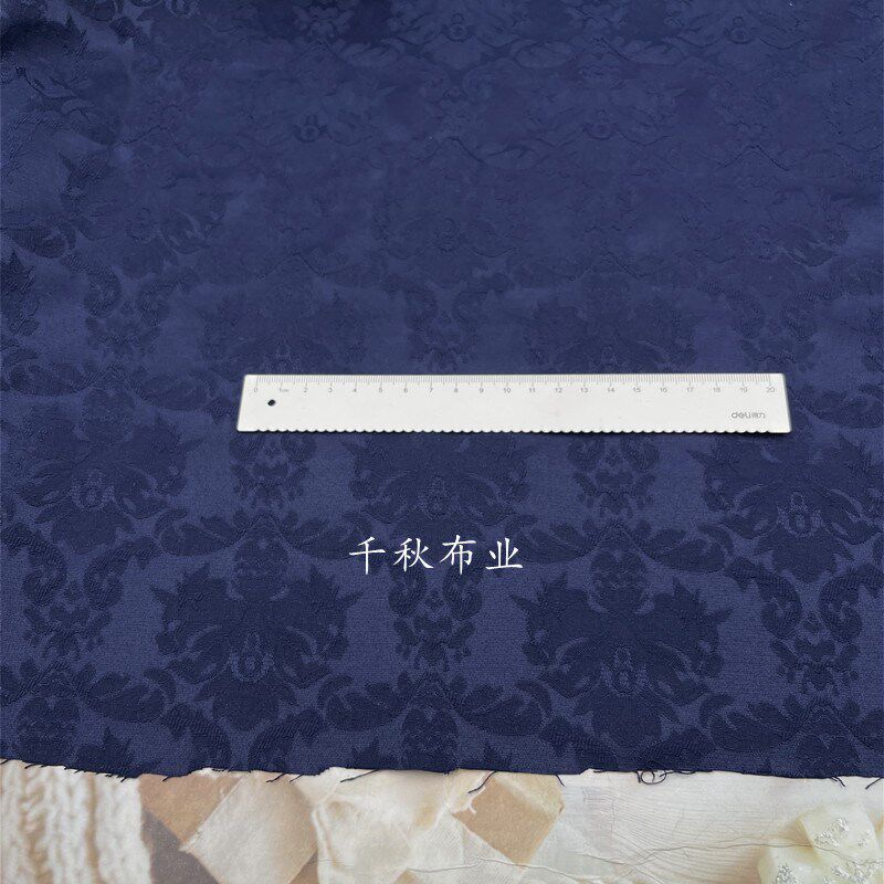 新款挺括弹性藏青色涤棉提布料春秋时尚浮雕立体纹重磅面料