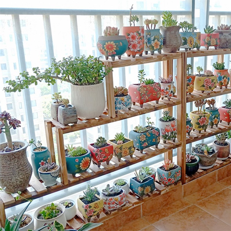 放在窗台上的花架阶梯式多层窗台高低多肉阳台台沿实木花架子