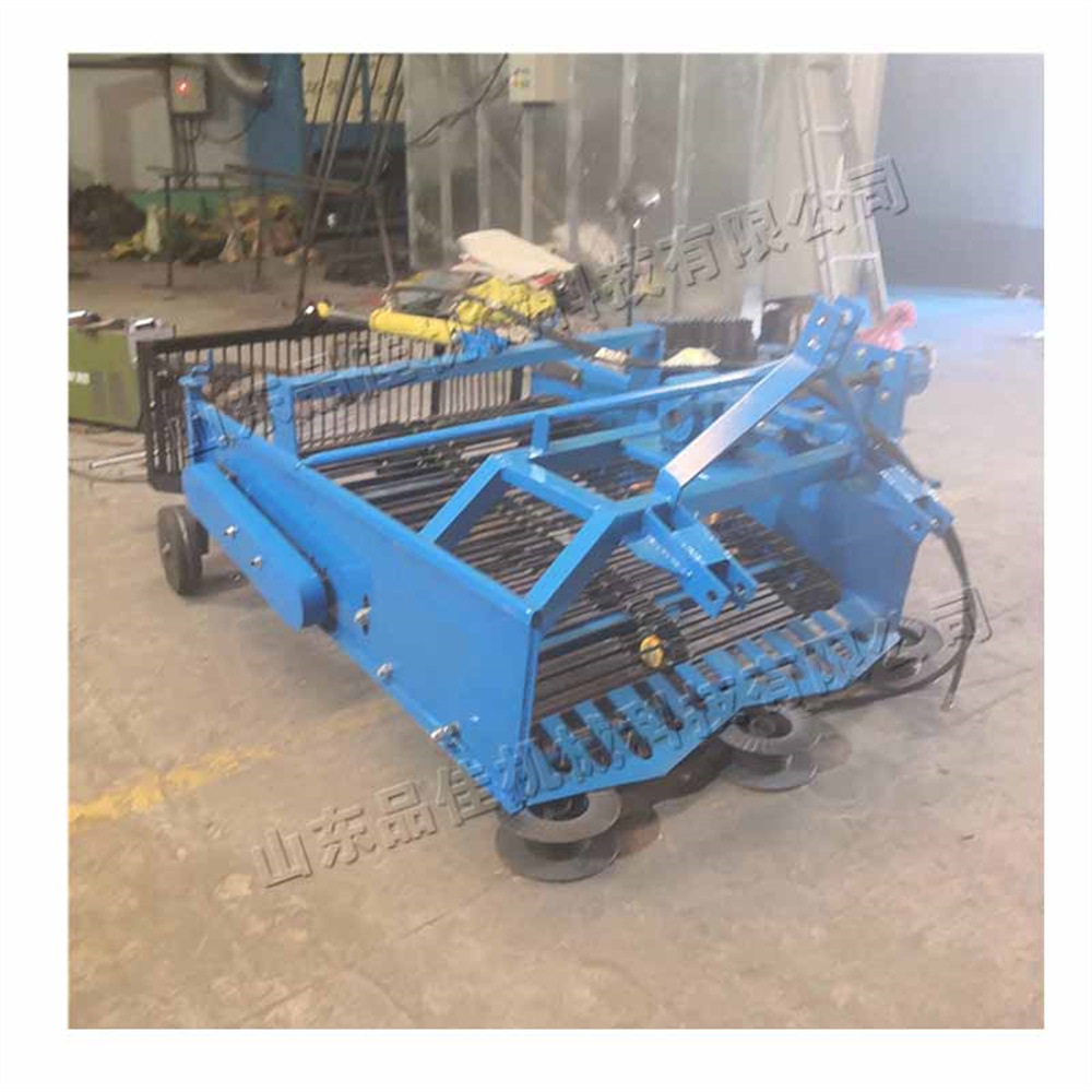 小型农田捡石机 田间管理石头清理机 拖拉牵引式碎石收集机