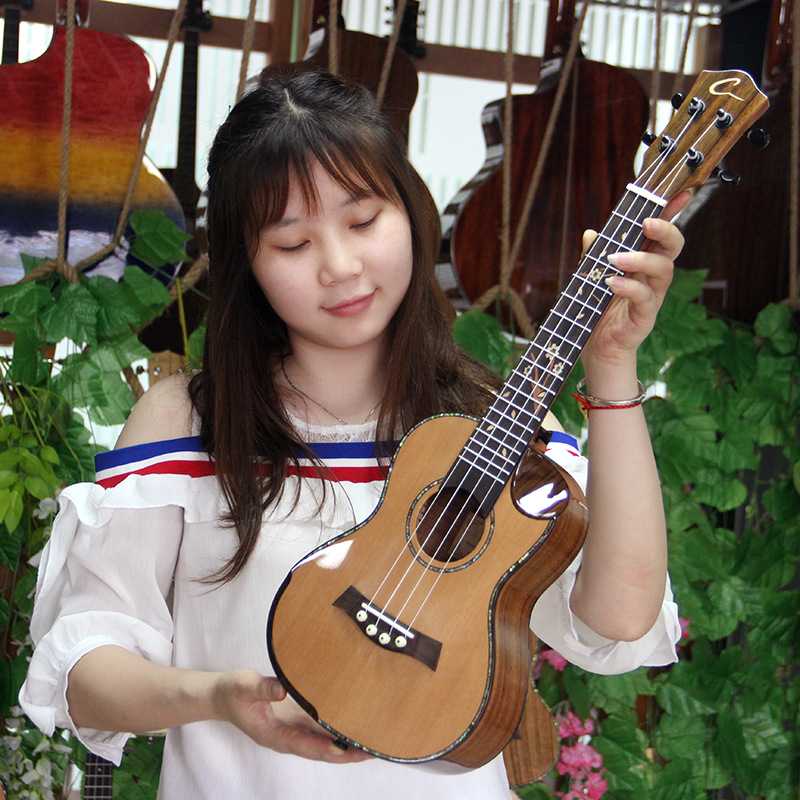 厂家供应24寸26寸尤克里里单板红松相思木夏威夷吉他 教学