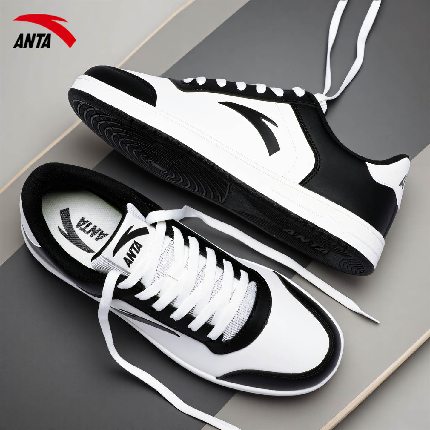 安踏男款运动板鞋秋冬黑白熊猫鞋