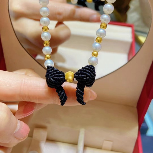 希曼汀珠宝999足金猫眼珠编织珠
