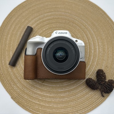 适用佳能R62真皮保护套R8/RP皮套R5/R6/R52/R7/R10/R50底座手腕带