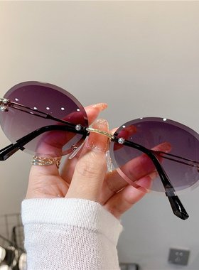 跨境新款 太阳镜女士椭圆形网红渐变色墨镜无框切边潮流眼镜