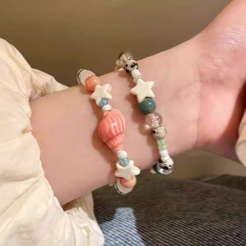 度假风海螺星星陶瓷串珠手链女小众精致手串高颜值学生党闺蜜手饰图片