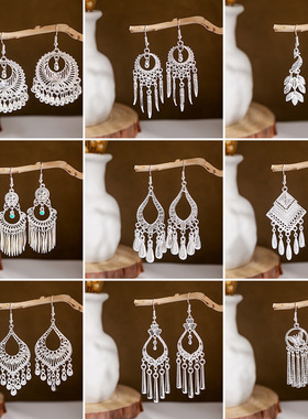 仿苗银耳环少数民族风孔雀铃铛流苏耳坠女镂空树叶耳饰品货源