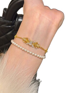 小众设计轻奢雪莺鸽子蛋手链x女时尚高级感重工莺尾花满钻爆闪手