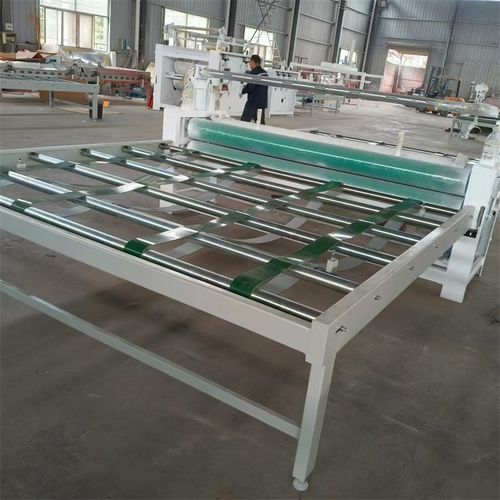 不锈钢板自动裱膜机 木饰面大板贴膜机 橱柜电梯门防盗门覆膜机