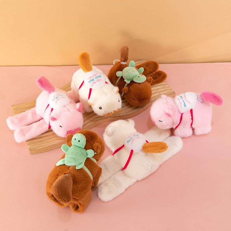 卡皮巴拉啪啪圈公仔毛绒玩具儿童玩偶布娃娃摇尾巴可爱水豚自行车