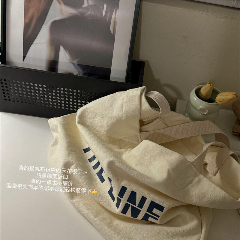 此外 百搭字母白色帆布包女大容量温柔淑女布P袋子包包小众搭配款