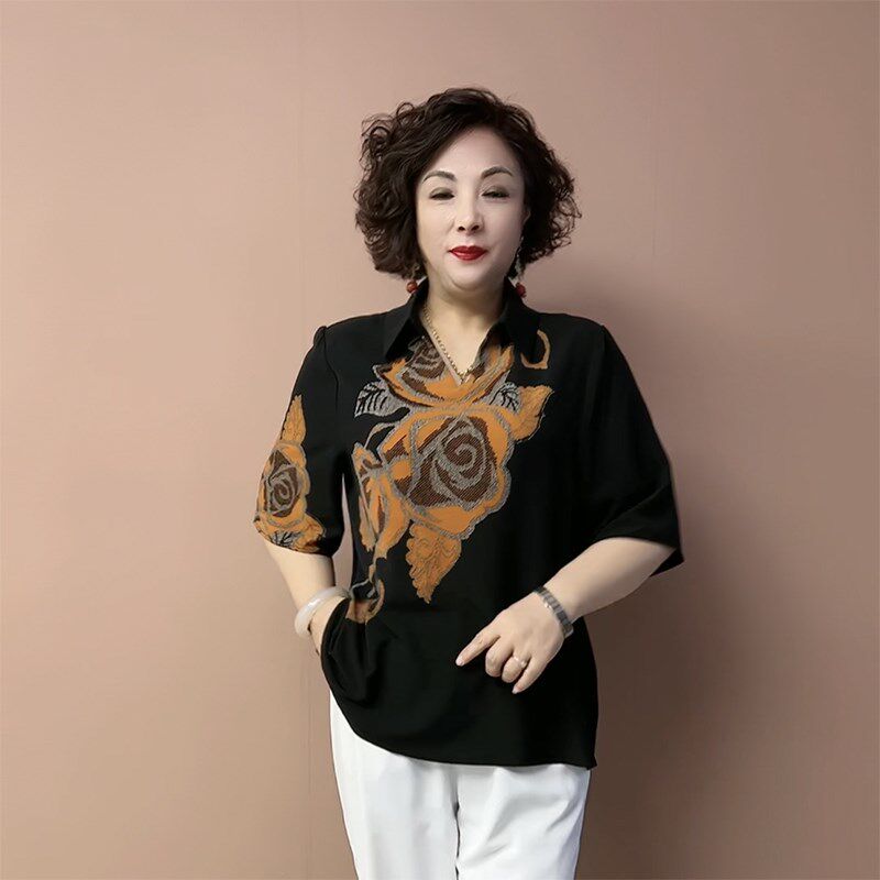 气质妈妈真丝上衣夏新款宽松大码高档定位花翻领短袖大版遮肉小衫