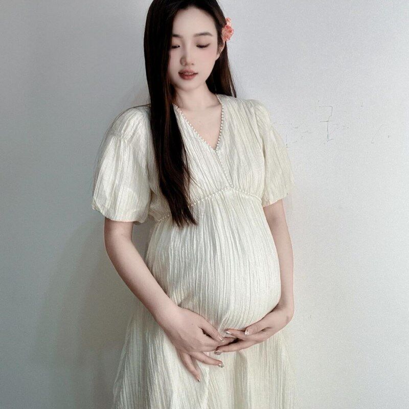孕妇连衣裙夏季新款时尚设计感钉珠泡泡袖纯色中长款裙子2025韩版