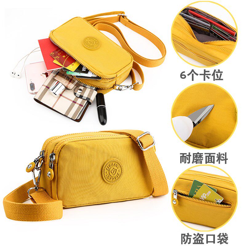 帆布手机包女斜挎迷你小包包2021年新款手腕零钱包手拿防水手拎包