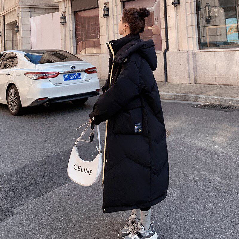 黑色中长款过膝羽绒棉服女冬季2024新款韩版宽松加厚连帽休闲棉衣