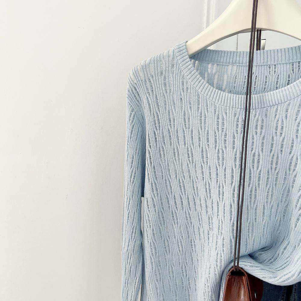 初春设计感小众镂空长袖针织衫女2026春款韩版薄款圆领短款小上衣