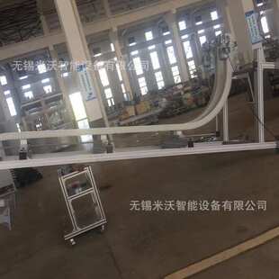 柔性链夹持升降机 夹瓶空箱输送机 牛奶薯片大桶水夹持高空输送机
