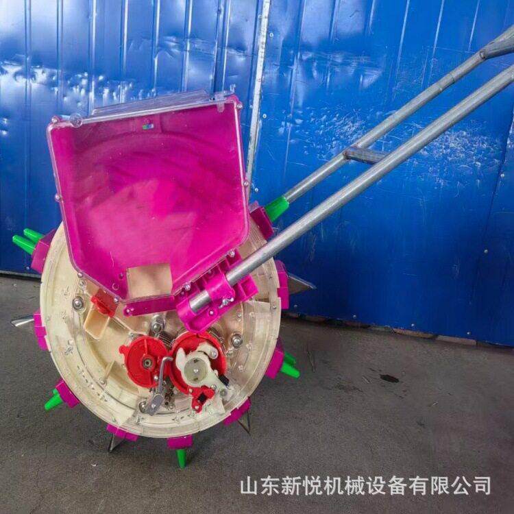手推式滚轮式播种器多功能小型玉米精播机大豆种植点播机
