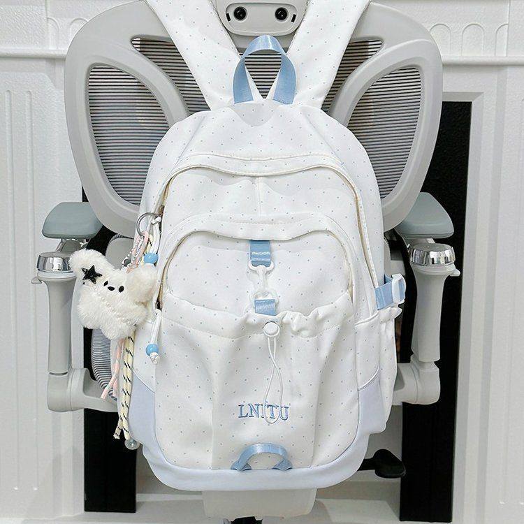 加厚消光斜面料双肩包通勤拉链涤纶休闲白色日常简约轻便撞色挂件