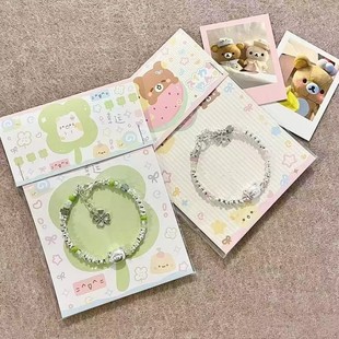 风传信轻松熊串珠手链2025新款米珠手串幸运四叶草小清新可爱学生