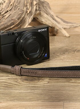 适用索尼黑卡RX100M4M5M6M7ZV-1牛皮手腕带理光GR2 GR3G7X2 3挂绳