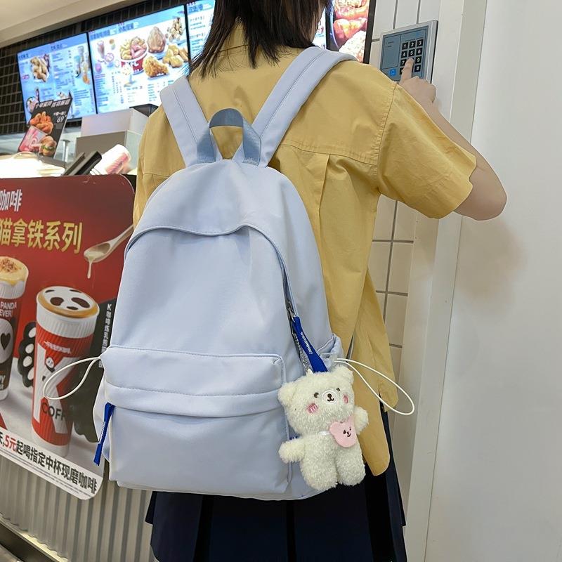 2022秋冬新品韩版纯色尼龙学生背包简约清新男女双肩背包