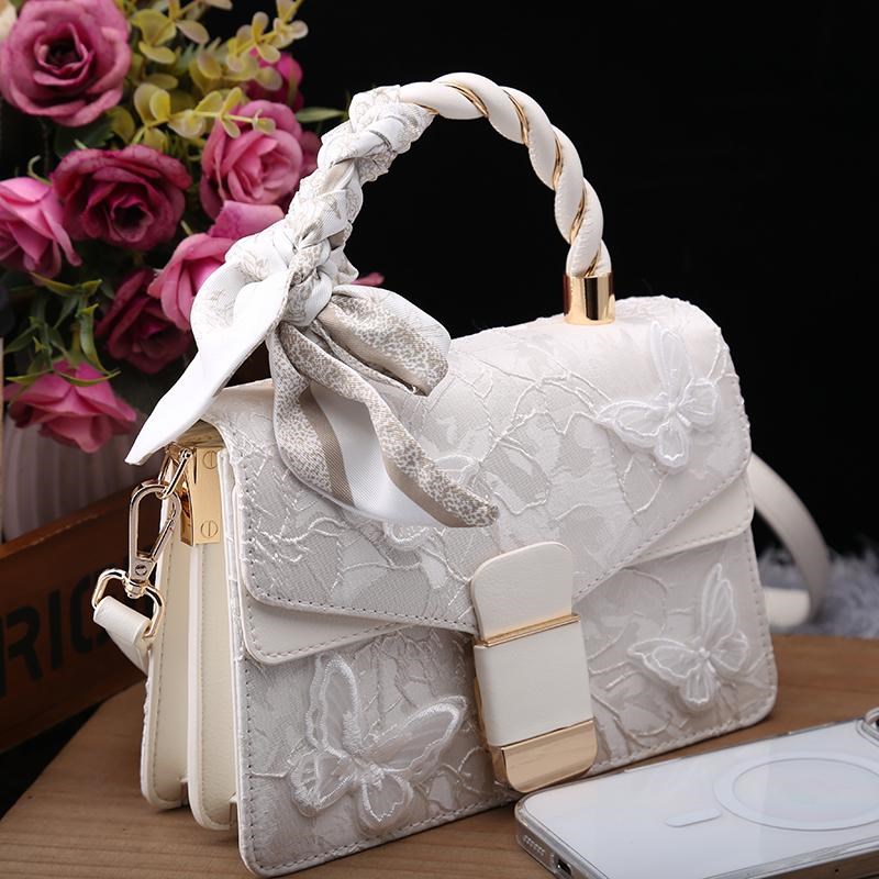 正品真皮女包2025新款时尚百搭牛皮刺绣洋气手提包单肩斜挎小方包