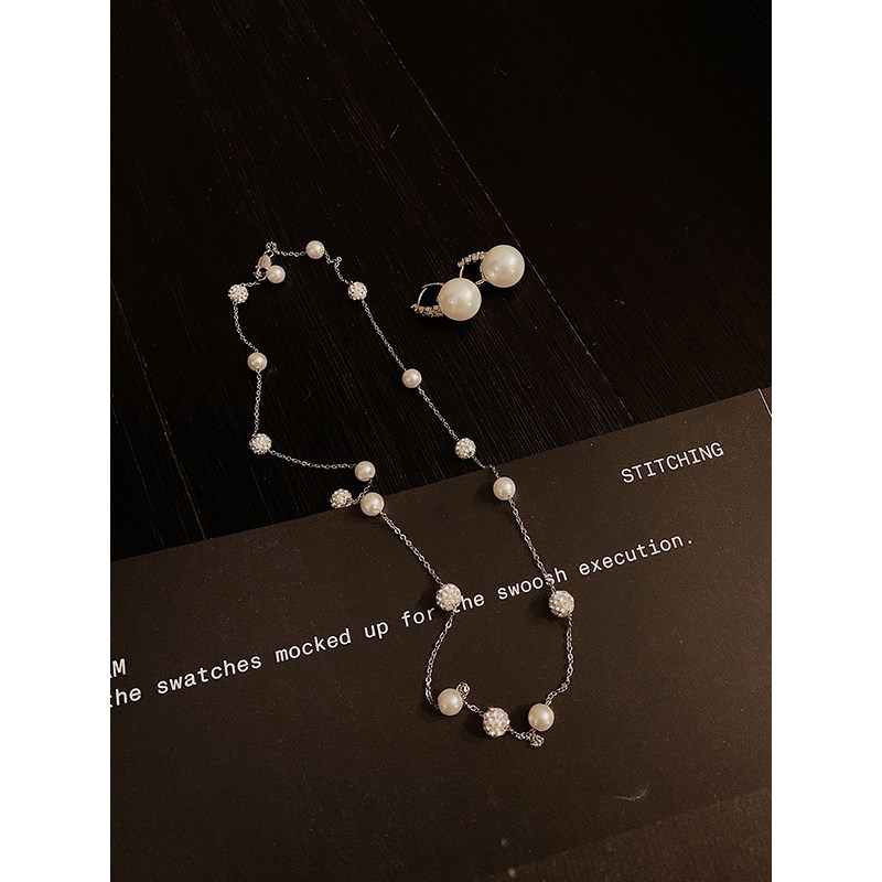 邱肉瑶 珍珠耳饰女高级2025新款爆款夏季轻奢长款V适合方圆脸耳钉