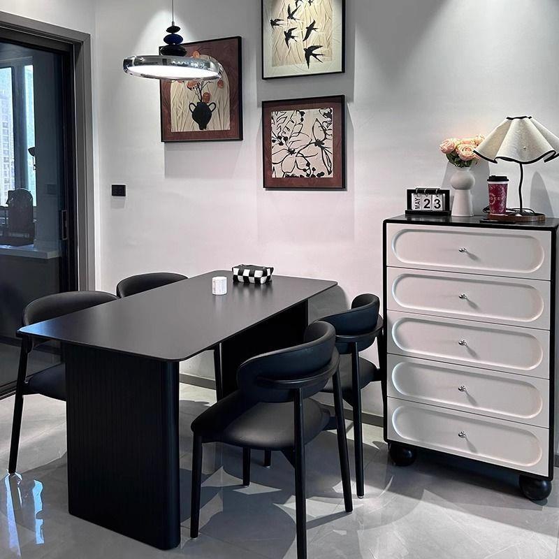 2025新款黑岩板餐桌椅组合现代意式家用轻奢饭桌长方形小户型简约