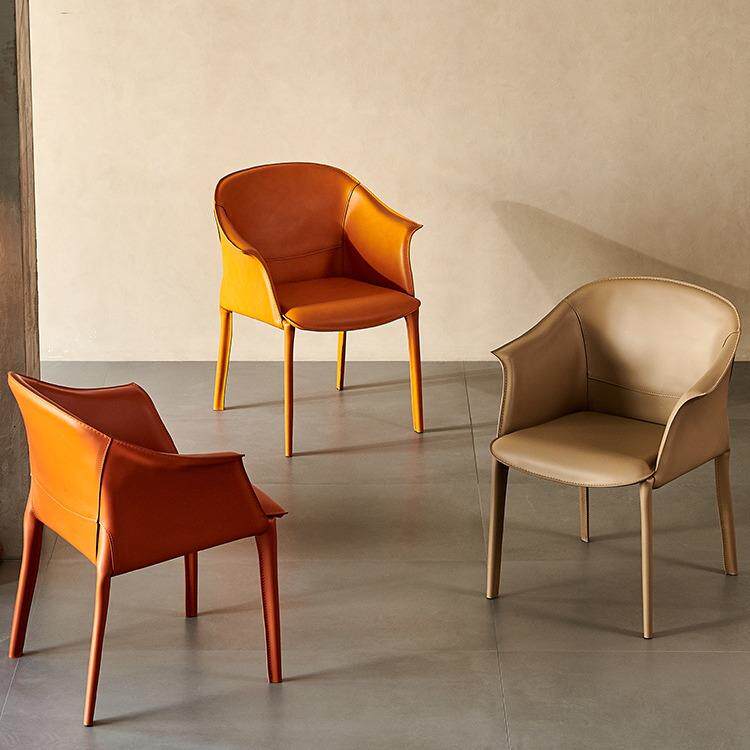 椅子家用意式马鞍皮餐椅简约餐桌凳子北欧设计师家具高弹海绵轻奢