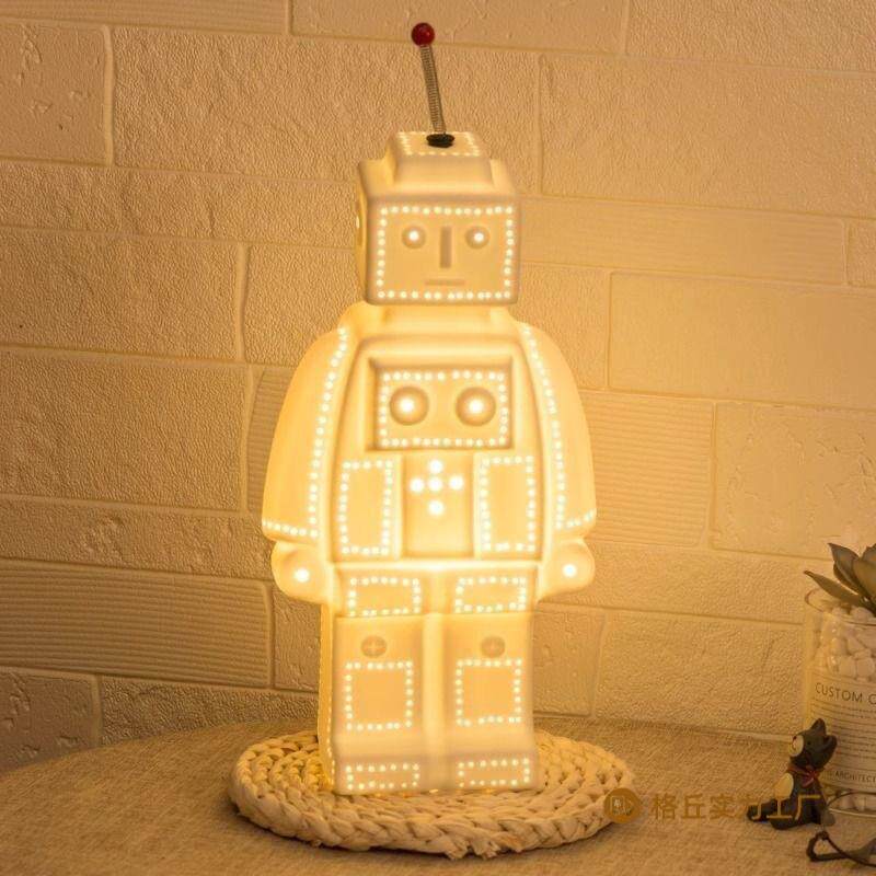 北欧男生卧室床头灯创意个性机器人台灯客厅书房现代简约装饰灯具