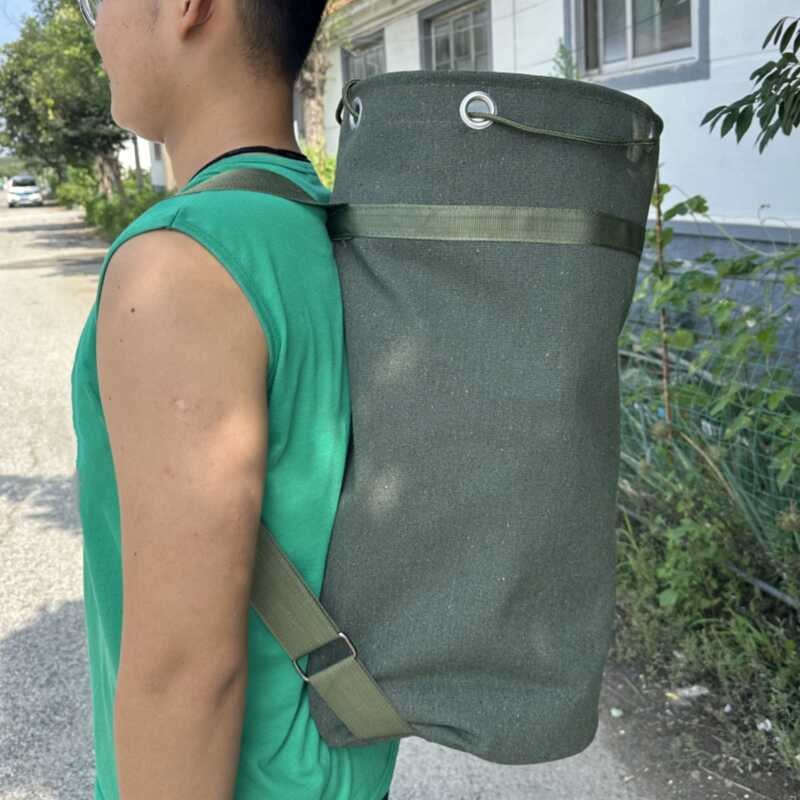 帆布背包外出背包背囊户外携行旅行加厚防尘超大容量双肩背包