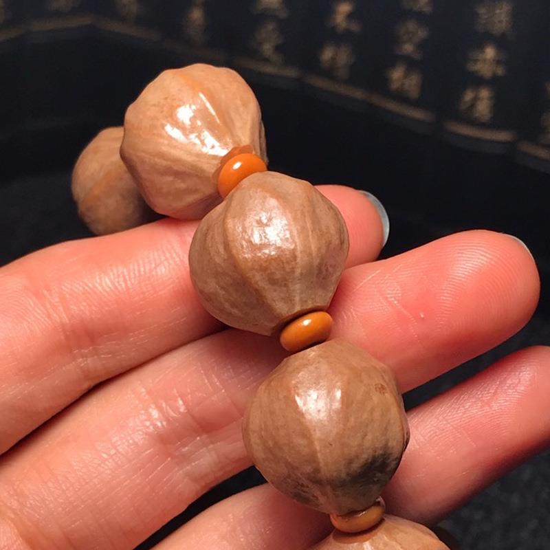 厂家直销精品原皮铁素核橄文男榄HXY410蒜核士玩易包浆铁核蒜头串