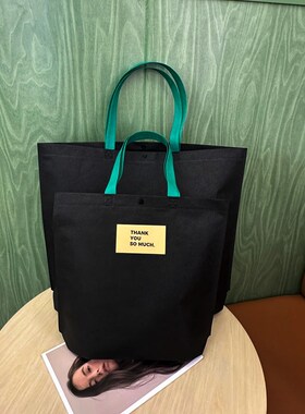 简约大气黑色暗扣无纺布手提袋服装店定M制logo肩背购物袋
