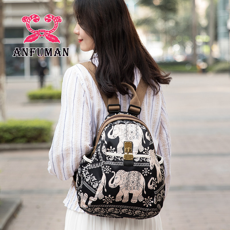 双肩包女2021新款春夏时尚包包休闲印花防盗牛津布帆布旅游背包潮