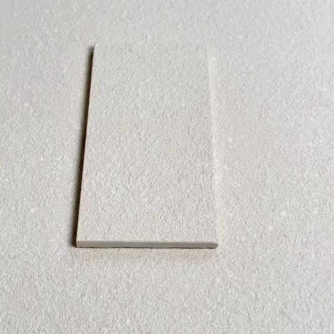 广东600奶白艺术漆荔枝麻面凹凸通体瓷砖民宿卫生间阳台庭院墙面